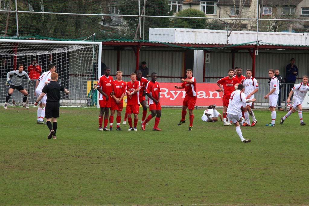 Why is the Hastings player lying down?