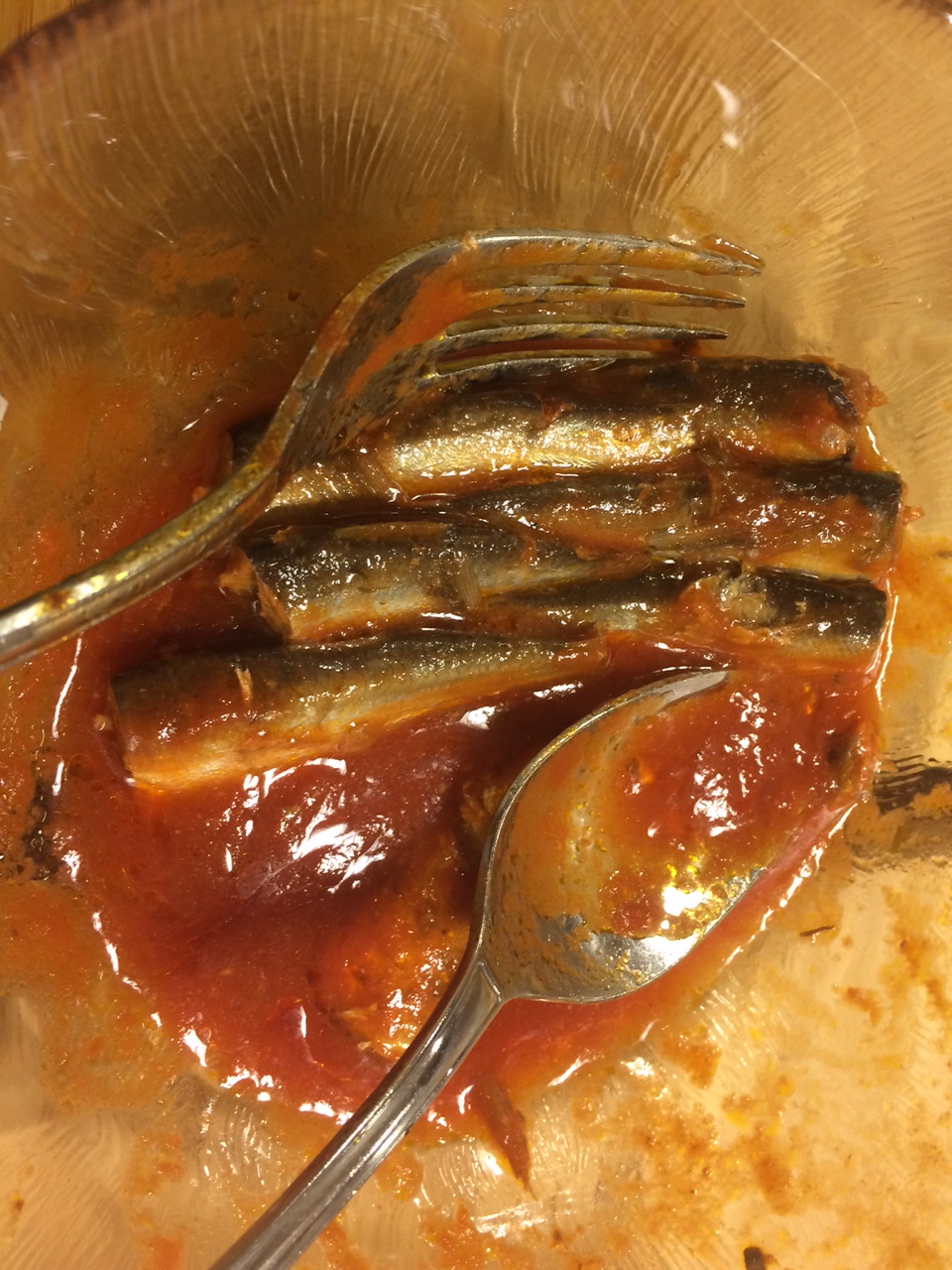 Curious fish dish for breakfast. not my breakfast though